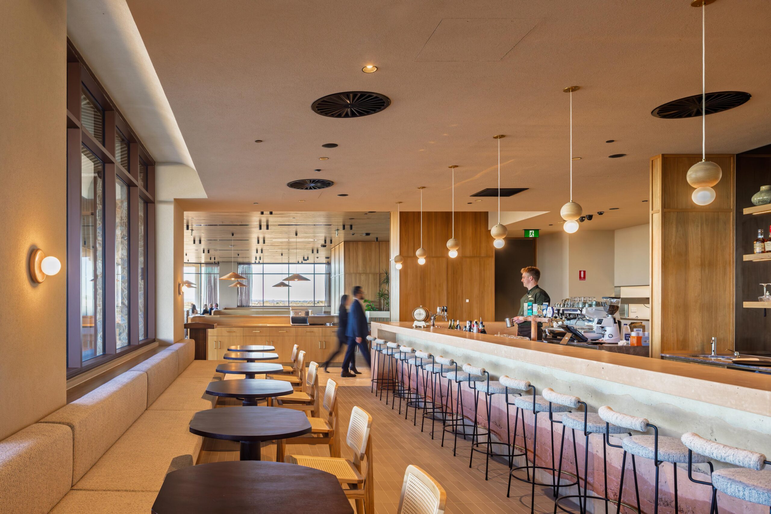 Woman walking through Monarto Safari Resort dining room