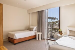 Twin bedroom in a Suite