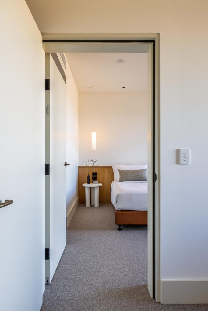 Interconnecting doors through guest rooms